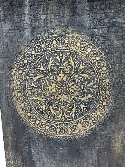 accent wall design in black marmorino plaster and bronze stencil