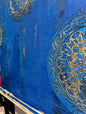 accent wall in royal blue and gold stencils