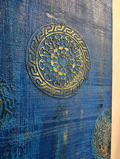 accent wall in royal blue and gold stencils
